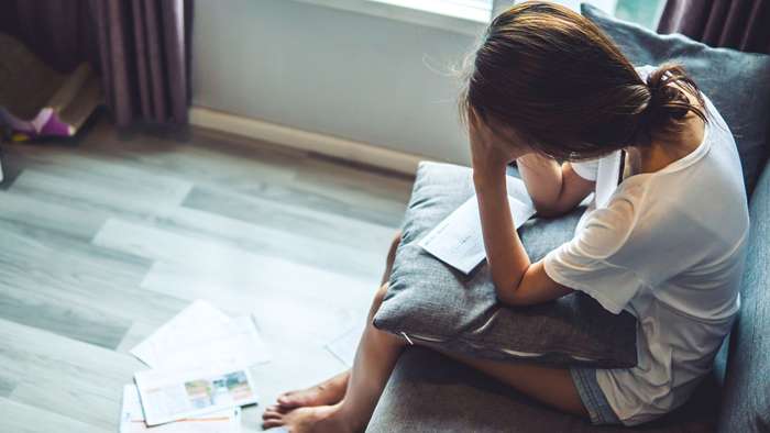 Conséquences de santé mentale troublantes de la dette